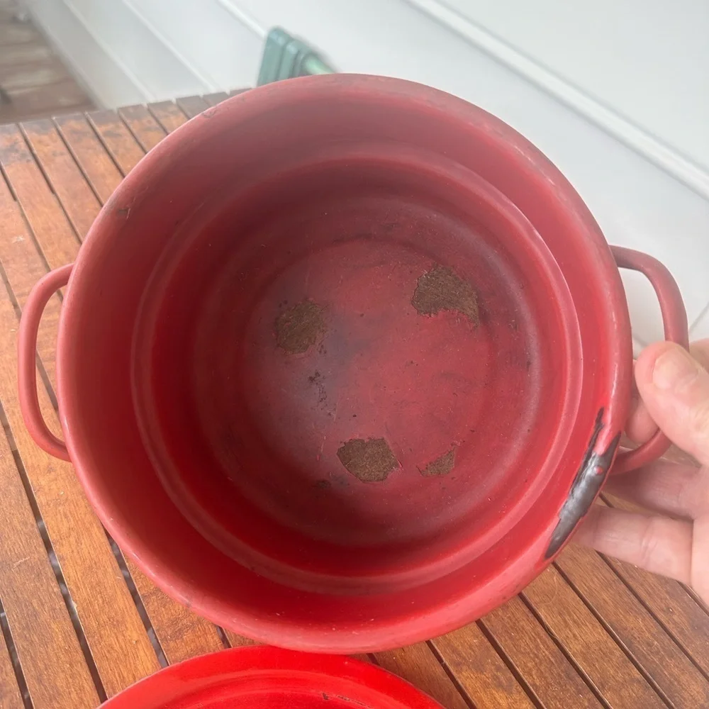 Red enamel pot with lid
